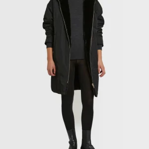 Long reversible coat in technical fabric and mink fur