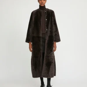 Extra long draped lambskin shearling coat