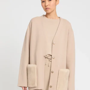 Belted knit and mink jacket