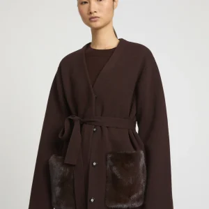 Belted knit and mink jacket
