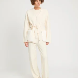 Belted knit and mink jacket