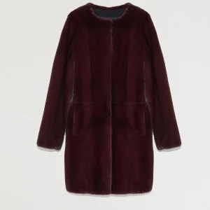 Collarless coat in long-haired mink